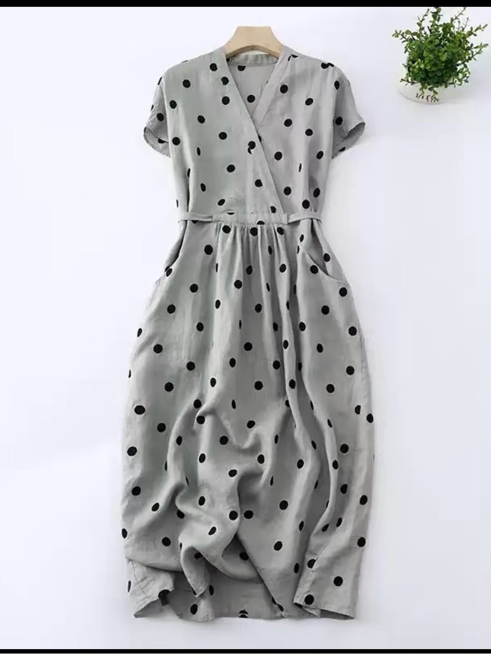 Cotten and linen blend Polka Dot Wrap Midi Dress in Sage with Black Dots.